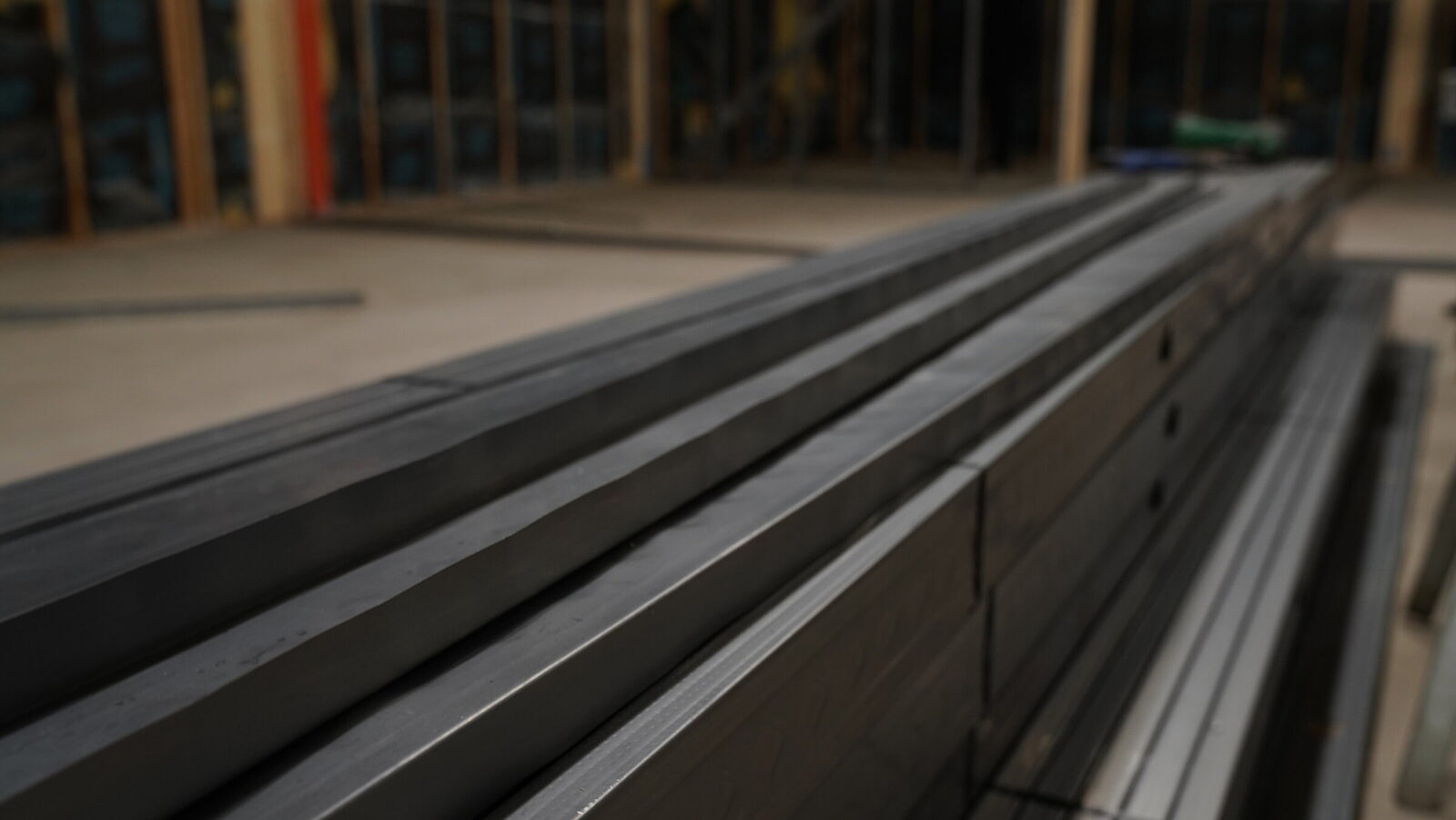 Flat steel bars staged for transport in the Calumet region