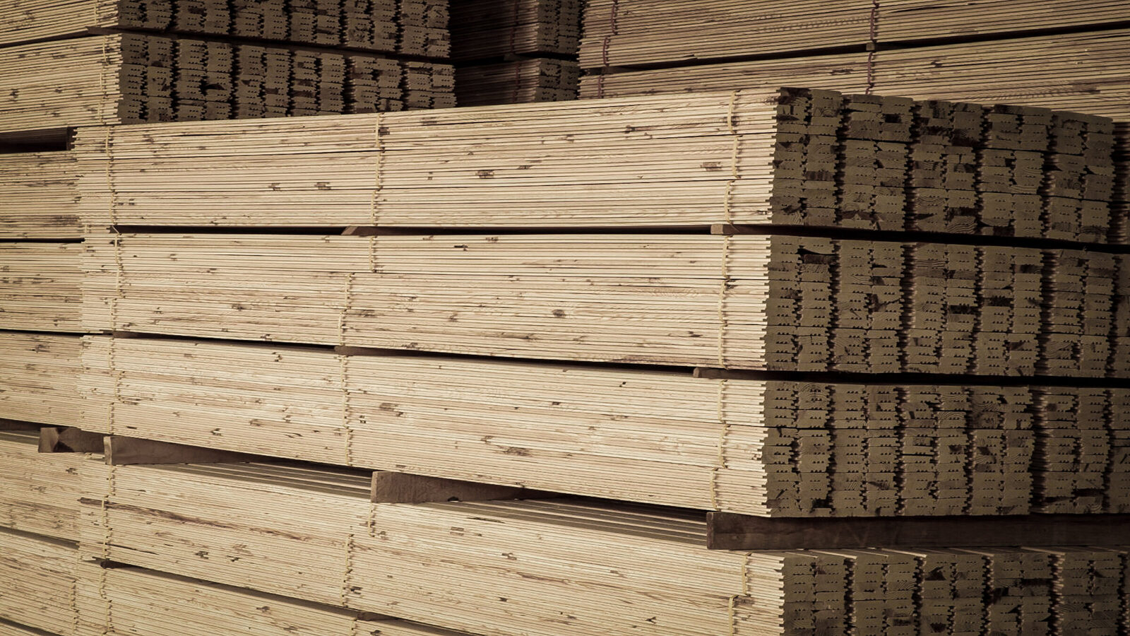 Stacked lumber bundles ready for transport