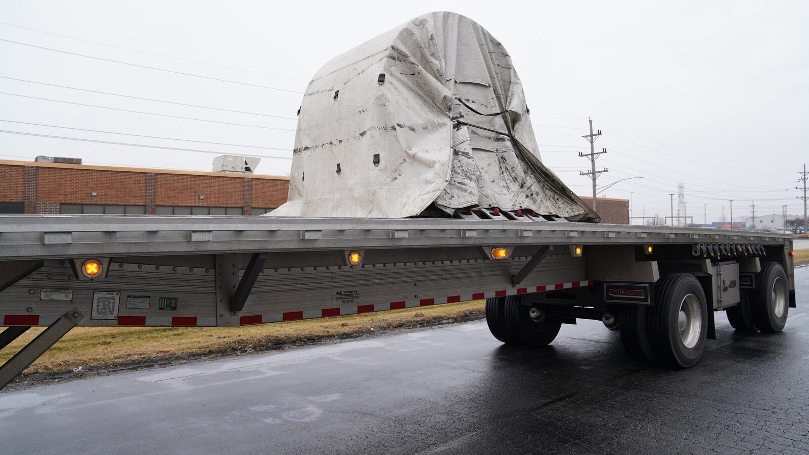 Tarped Grid-Line flatbed on a Central Indiana route